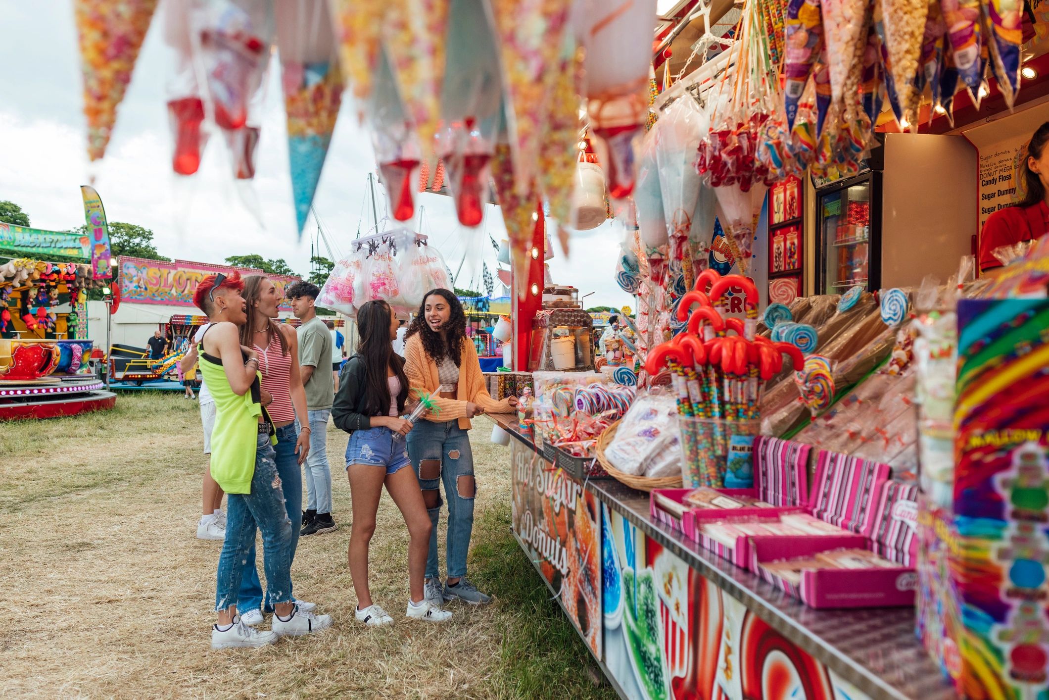 Customers ordering food from a mobile catering stand