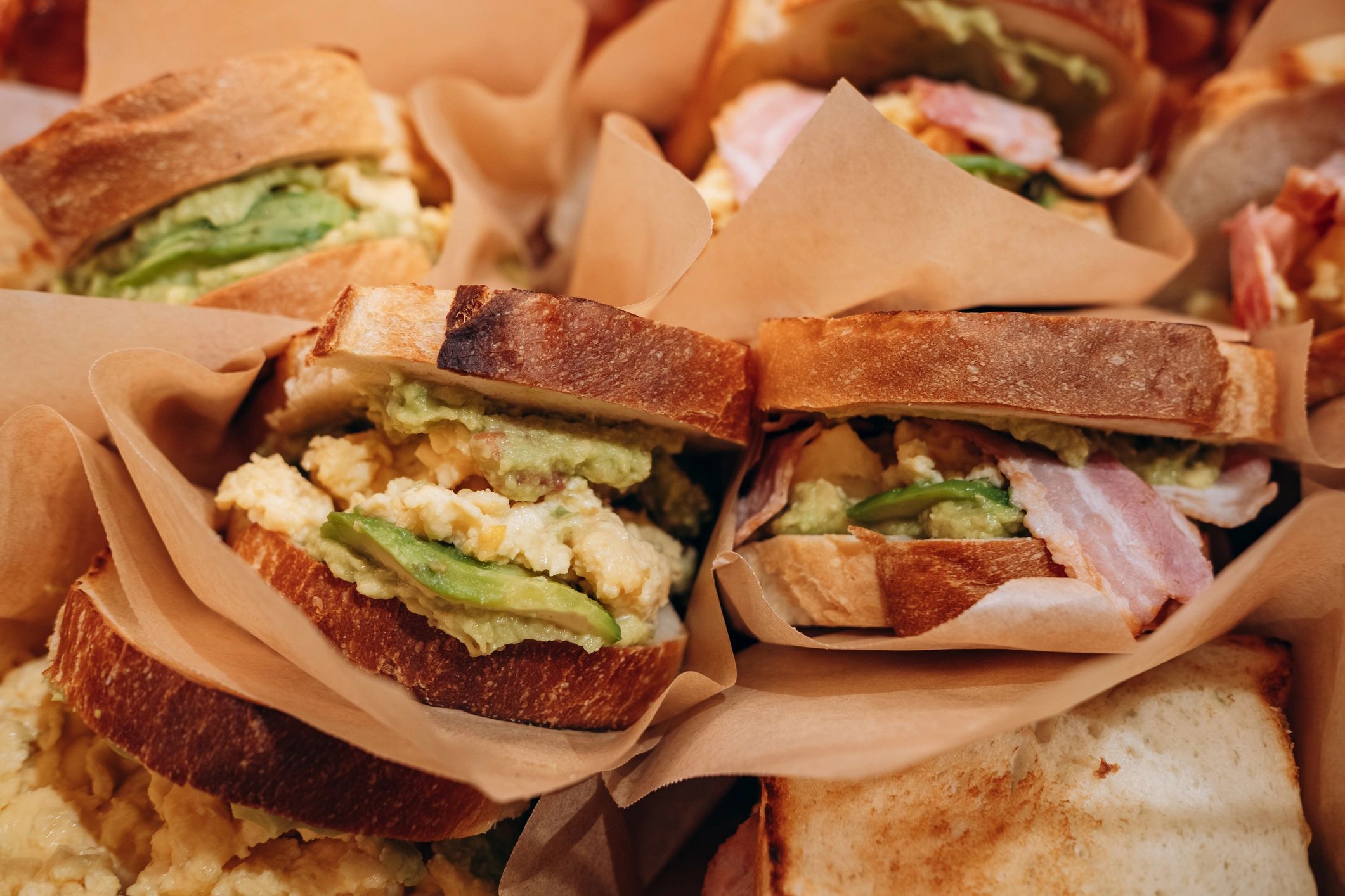 Fresh wrapped breakfast and lunch sandwiches prepared for catering